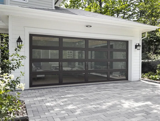 Colorado Springs Garage Door Repair design specialist presenting custom garage door options to Colorado Springs homeowner