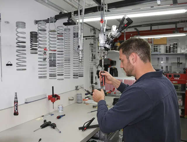 Colorado Springs Garage Door Repair safety certified technician performing precision spring replacement in Colorado Springs