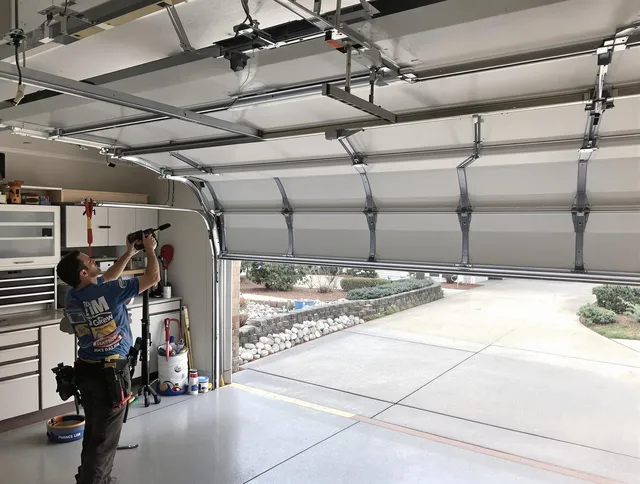 Garage door track repair service by Colorado Springs Garage Door Repair in Colorado Springs